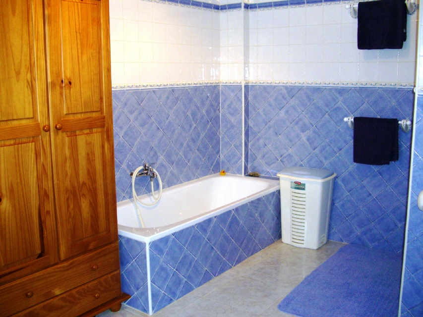 bathroom with wash basin, bidet, toilet, shower and bathtub