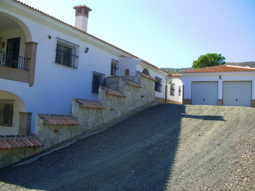 garage driveway with automatic lighting