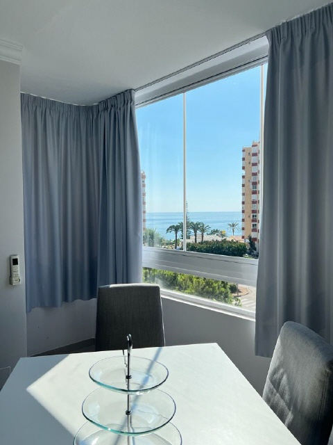 Bella Vista - dining area with sun curtains